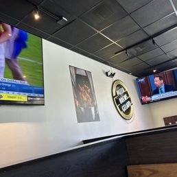 The West wall, they have 4-5 TVs in the place. All on different channels.