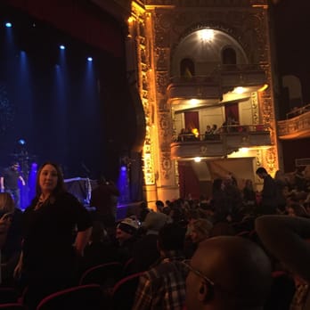 Cafe at Apollo - a woman standing in front of a crowd - Music Venues Near Me - New York, New York