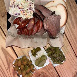Brisket/ lean and moist + jalepeno cheese sausage, okra, green beans and coleslaw with the fixings Brisket/ lean and moist + jalepeno cheese sausage, okra, green beans and coleslaw with the fixings