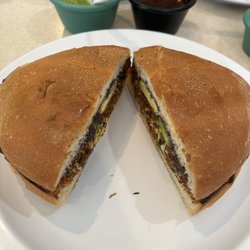 La Tienda Latina - Chorizo sandwich . It had avocado and black beans :) it was great . Bun super fresh