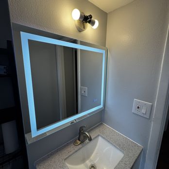 HandyRocks - After - That's a smart mirror that requires a power supply. My job was to wire and install the outlet behind this mirror. - Handyman Near Me - Denver, Colorado HandyRocks - After - That's a smart mirror that requires a power supply. My job was to wire and install the outlet behind this mirror. - Handyman Near Me - Denver, Colorado
