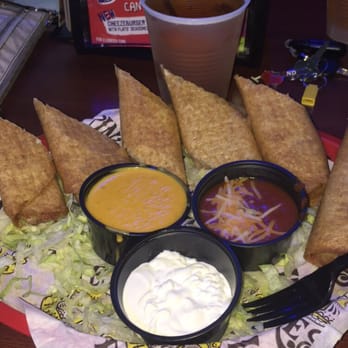 Tijuana Flats - Refried beans flautas on wheat - Mexican Near Me - Orlando, Florida Tijuana Flats - Refried beans flautas on wheat - Mexican Near Me - Orlando, Florida