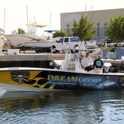 Signs Unlimited - 7 matching boats for Dream Catcher charters!