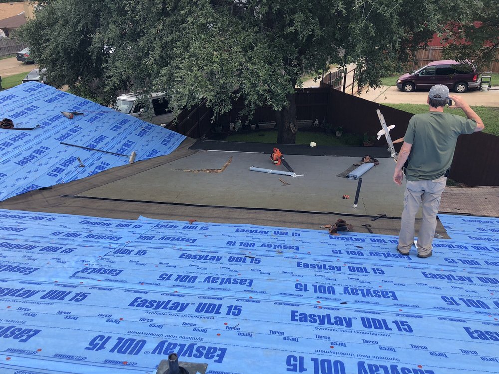 Slide of Einstein Roofing and Restoration