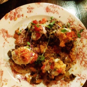 FINKA Table & Tap - Tostones topped with vaca frita - Asian Fusion Near Me - Miami, Florida FINKA Table & Tap - Tostones topped with vaca frita - Asian Fusion Near Me - Miami, Florida