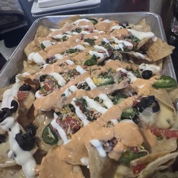 Putney's Pitstop Sports Bar and Grill - Nachos - Sports Bars Near Me - Tucson, Arizona Putney's Pitstop Sports Bar and Grill - Nachos - Sports Bars Near Me - Tucson, Arizona