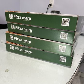 Pizza Maru - Four Pizza Maru pizza boxes - Pizza Near Me - North York, Ontario Pizza Maru - Four Pizza Maru pizza boxes - Pizza Near Me - North York, Ontario