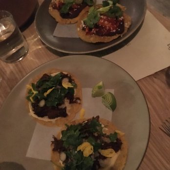 Colita - Lamb barbacoa tacos (forefront) + chicken tinga tostada (back) - New American Near Me - Minneapolis, Minnesota