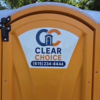 Clear Choice Site Services - Bright orange portable toilet placed at a residential construction site, ready for daily use by the crew - Portable Toilet Services Near Me - Gallatin, Tennessee Clear Choice Site Services - Bright orange portable toilet placed at a residential construction site, ready for daily use by the crew - Portable Toilet Services Near Me - Gallatin, Tennessee