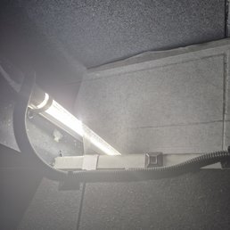 The metal net on top of the divider has a gap due to the florescent light and that is where casings from the adjacent lane coming in The metal net on top of the divider has a gap due to the florescent light and that is where casings from the adjacent lane coming in