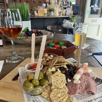 Wine Bar Brenham - a platter of cheese, meat, olives, and crackers - Wine Bars Near Me - Brenham, Texas Wine Bar Brenham - a platter of cheese, meat, olives, and crackers - Wine Bars Near Me - Brenham, Texas