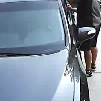1-800-Dent-Doc - This is a picture of the guy with his dent removal tool very near where he add a new dent to the chrome trim. - Mobile Dent Repair Near Me - Tustin, California 1-800-Dent-Doc - This is a picture of the guy with his dent removal tool very near where he add a new dent to the chrome trim. - Mobile Dent Repair Near Me - Tustin, California