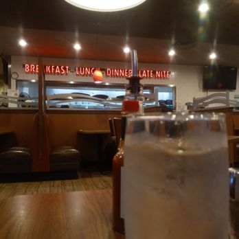 Denny's - a glass of water on a table - American Near Me - Big Spring, Texas