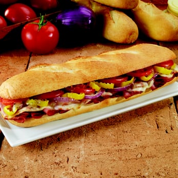 Marco's Pizza - a sub sandwich on a plate - Pizza Near Me - Spring Lake, Michigan