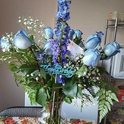Silver Heights Florist - Wanted to get Blue roses for my favorite girl's birthday & this place didn't disappoint.