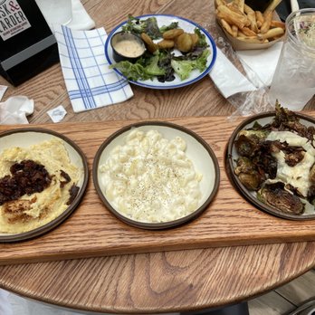 Cask & Larder - Pick 3 with cheese grits, Mac and cheese, roasted Brussels sprouts. - Southern Near Me - Orlando, Florida Cask & Larder - Pick 3 with cheese grits, Mac and cheese, roasted Brussels sprouts. - Southern Near Me - Orlando, Florida