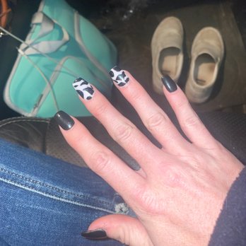 Tomball Nails - This is my right hand where you can clearly see even with the powder still on my skin it does not take up the whole tip of my finger. - Nail Salons Near Me - Tomball, Texas