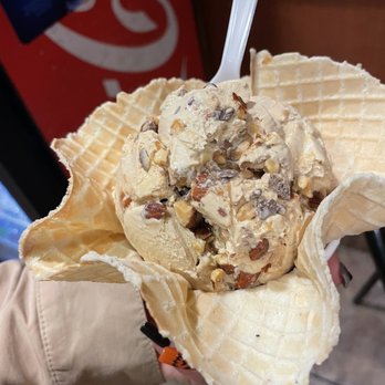 Cold Stone Creamery - a person holding a cone of ice cream - Ice Cream & Frozen Yogurt Near Me - Grand Junction, Colorado Cold Stone Creamery - a person holding a cone of ice cream - Ice Cream & Frozen Yogurt Near Me - Grand Junction, Colorado