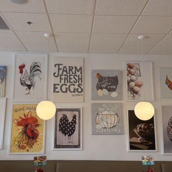 Eggs Up Grill - Fun Artwork along the wall by our table - Breakfast & Brunch Near Me - Cleveland, Tennessee