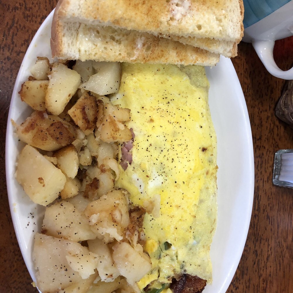 Loaded omelet, home fries and homemade bread toast Loaded omelet, home fries and homemade bread toast