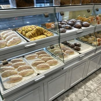 Pâtisserie Coco - Their display cabinets. Pull out and the door automatically opens up to help minimize exposure to everything. - Bakeries Near Me - Montreal, Quebec Pâtisserie Coco - Their display cabinets. Pull out and the door automatically opens up to help minimize exposure to everything. - Bakeries Near Me - Montreal, Quebec