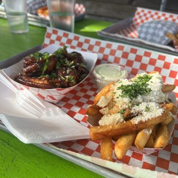 Sideshow Kitchen - Nashville hot honey wings + garlic fries - Burgers Near Me - Oakland, California