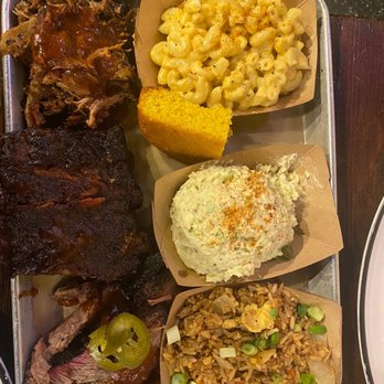 Dinosaur Bar-B-Que - (L-R, Top to bottom) Pulled pork, macaroni and cheese, St. Louis Ribs, Harlem potato salad, BBQ Brisket, and BBQ Fried Rice. - Barbeque Near Me - Brooklyn, New York Dinosaur Bar-B-Que - (L-R, Top to bottom) Pulled pork, macaroni and cheese, St. Louis Ribs, Harlem potato salad, BBQ Brisket, and BBQ Fried Rice. - Barbeque Near Me - Brooklyn, New York