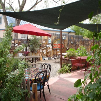 Java Junction - a patio area with tables and chairs - Bed & Breakfast Near Me - Madrid, New Mexico