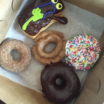 Voodoo Doughnut - Raspberry filled ghost; maple old fashion; plain chocolate donut; sprinkles cake; mexican hot chocolate (the best) - Donuts Near Me - Denver, Colorado Voodoo Doughnut - Raspberry filled ghost; maple old fashion; plain chocolate donut; sprinkles cake; mexican hot chocolate (the best) - Donuts Near Me - Denver, Colorado