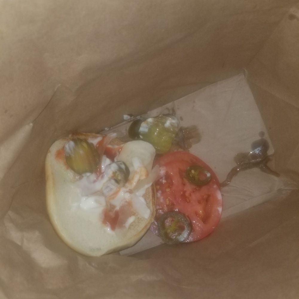 Jack in the Box - Ordered a jumbo jack with jalapenos. They put half of the burger in the box and the other half in the bag. - Fast Food Near Me - San Pedro, California