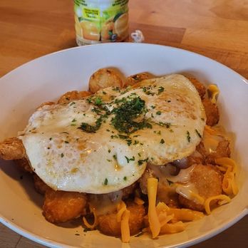 The Biscuit Joint - Loaded TOTS, shredded cheese, tots, over easy eggs, sausage gravy - Breakfast & Brunch Near Me - Saint Louis, Missouri The Biscuit Joint - Loaded TOTS, shredded cheese, tots, over easy eggs, sausage gravy - Breakfast & Brunch Near Me - Saint Louis, Missouri
