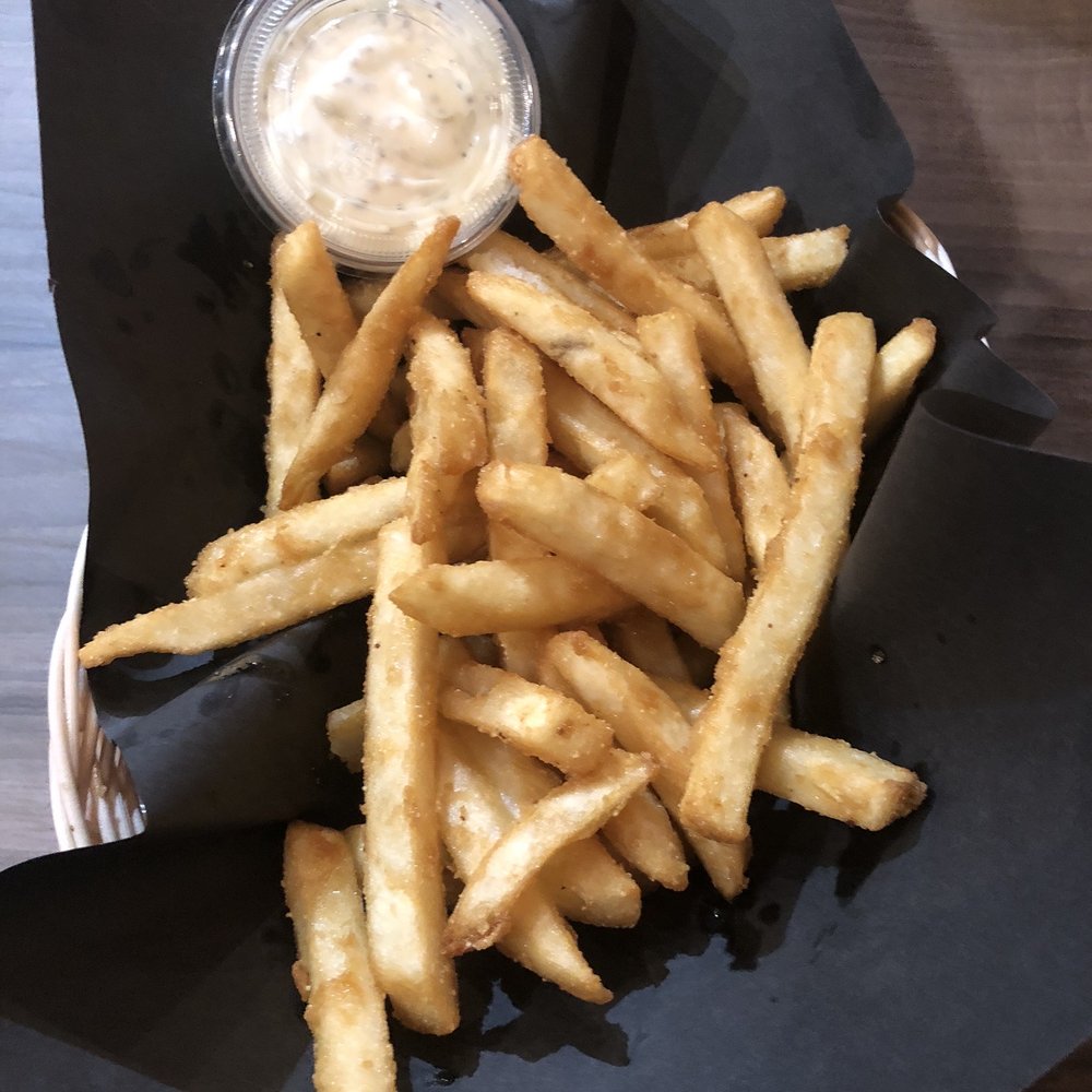 Side of fries with aioli dipping sauce Side of fries with aioli dipping sauce