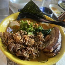 Red ramen with pork and pork belly, added egg and chili paste.
