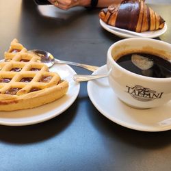 Riccardo Taliani - Apricot tart and an Americano coffee