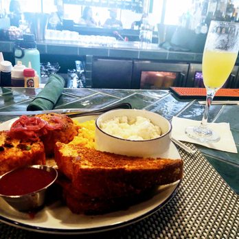 Breakfast At Barneys - Salmon croquettes, eggs, grits, & toast. Mimosa on the side! - Breakfast & Brunch Near Me - Atlanta, Georgia Breakfast At Barneys - Salmon croquettes, eggs, grits, & toast. Mimosa on the side! - Breakfast & Brunch Near Me - Atlanta, Georgia