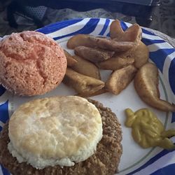 Strawberry muffin, steak biscuit with mustard and country fries