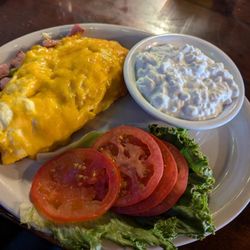 Buzz Inn Steakhouse - Denver Omelet for $14.99 + $0.99 for Cottage Cheese & +0.99 for Tomatoes.