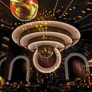 Drop Dead Gorgeous - Disco Ball Entrance on the left.  DJ booth behind. - Speakeasies Near Me - Tempe, Arizona
