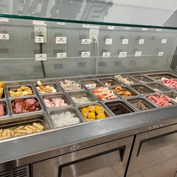Yin Tang - a variety of food items in a display case - Chinese Near Me - Carrollton, Texas Yin Tang - a variety of food items in a display case - Chinese Near Me - Carrollton, Texas