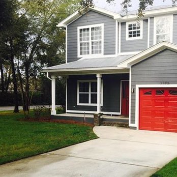 Greenview Services - a house with a red garage door - Landscaping Near Me - Crestview, Florida