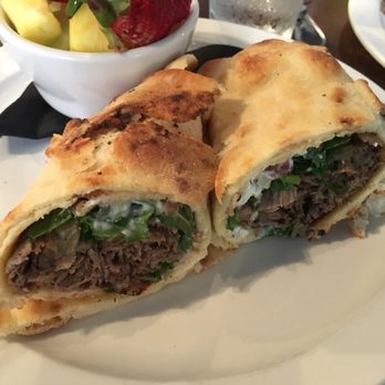B Matthews Eatery - Lamb Gyro: lamb, caramelized onions, tomato, feta cheese, arugula, tzatziki sauce, naan bread - New American Near Me - Savannah, Georgia