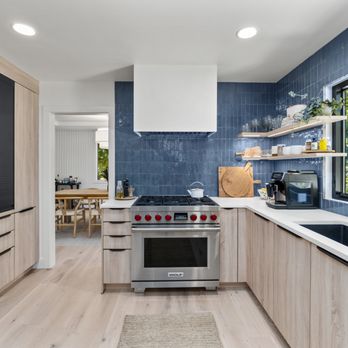 Home Care Contractors - a modern kitchen with wood cabinets and stainless steel appliances - General Contractors Near Me - Bothell, Washington Home Care Contractors - a modern kitchen with wood cabinets and stainless steel appliances - General Contractors Near Me - Bothell, Washington