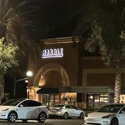 Exterior outside entrance of Marble Steakhouse & Grille - Irvine, California Exterior outside entrance of Marble Steakhouse & Grille - Irvine, California