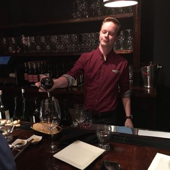 The Vineyard Winemarket - Ashton pouring. - Wine Bars Near Me - Smyrna, Georgia