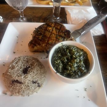 Blvck Cow - Pork chop with rice and peas and creamed spinach - Cocktail Bars Near Me - Bowie, Maryland