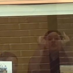 City National Bank - Teller flipping off people through the drive up window at City National Bank.