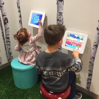 Tatum Pediatric Dentistry - Playing with iPads at the dentist! - Pediatric Dentists Near Me - Scottsdale, Arizona Tatum Pediatric Dentistry - Playing with iPads at the dentist! - Pediatric Dentists Near Me - Scottsdale, Arizona