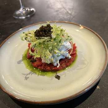 Trust - Our favorite salad which features caviar and sun dried tomato on the bottom (looks like beef tartare) - Tapas/Small Plates Near Me - Santa Ana, California Trust - Our favorite salad which features caviar and sun dried tomato on the bottom (looks like beef tartare) - Tapas/Small Plates Near Me - Santa Ana, California
