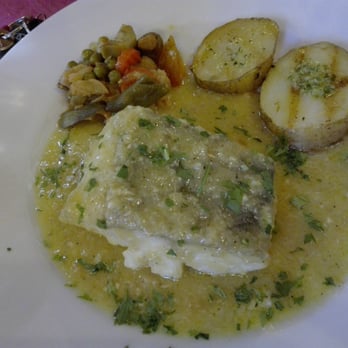 El Cruce - Lomo de bacalao en salsa - Tabernas Near Me - El Pedroso, SE