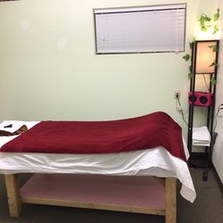 New Day Massage - One of several private rooms which features soothing music and heated full length pad for comfort.